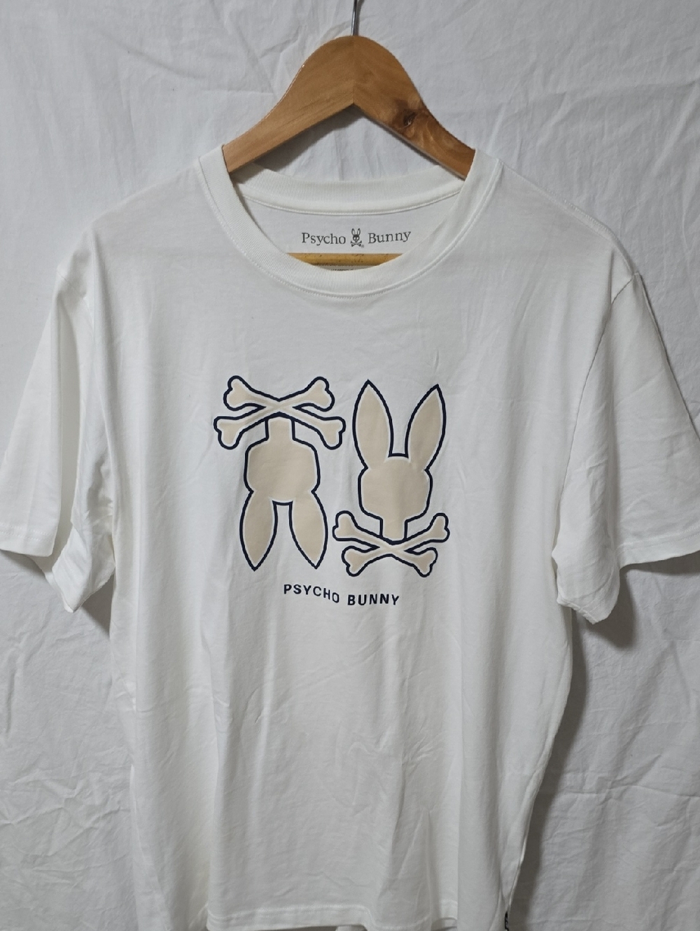 Psycho Bunny White Tee with Navy Outline and Cream Logo